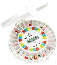 Pill dispenser opened with pills in